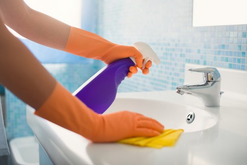 Deep cleaning bathroom during end of tenancy service