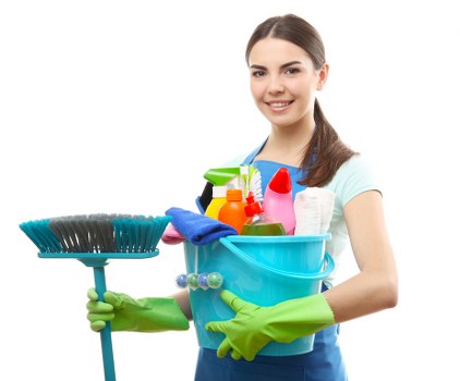 Technician treating stains during sofa cleaning in Westhampstead